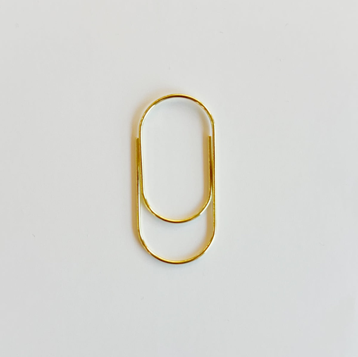 Big metal paper clips grouped together