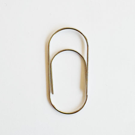 Big metal paper clip close-up detail