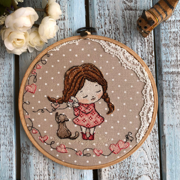 Beech wood hoop with finished punch needle piece, hung up