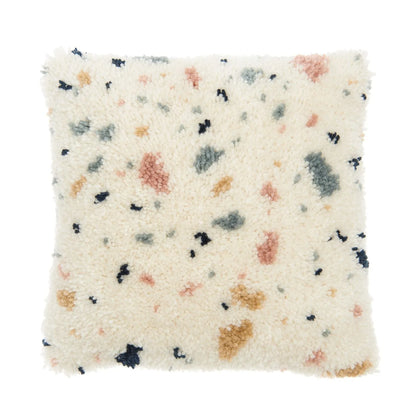 Latch hook rug kit with terrazzo cushion design by Rico Design