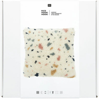 Latch hook rug kit with terrazzo cushion design by Rico Design