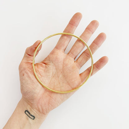 Golden metal ring detail, 9.5cm