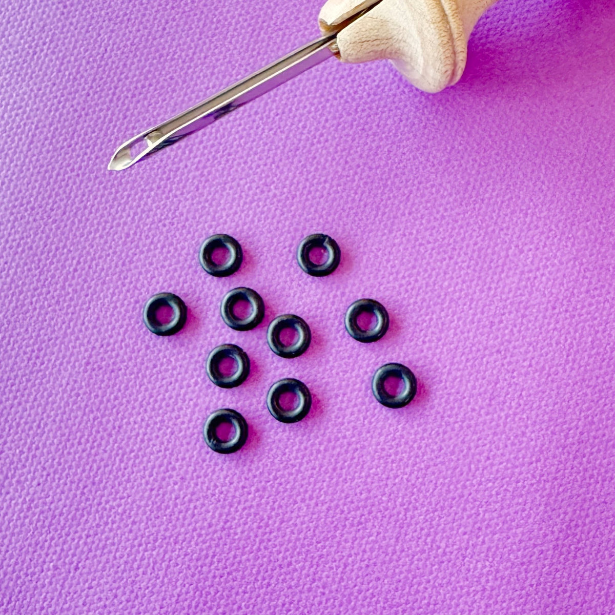Oxford punch needle rubber rings, close-up detail