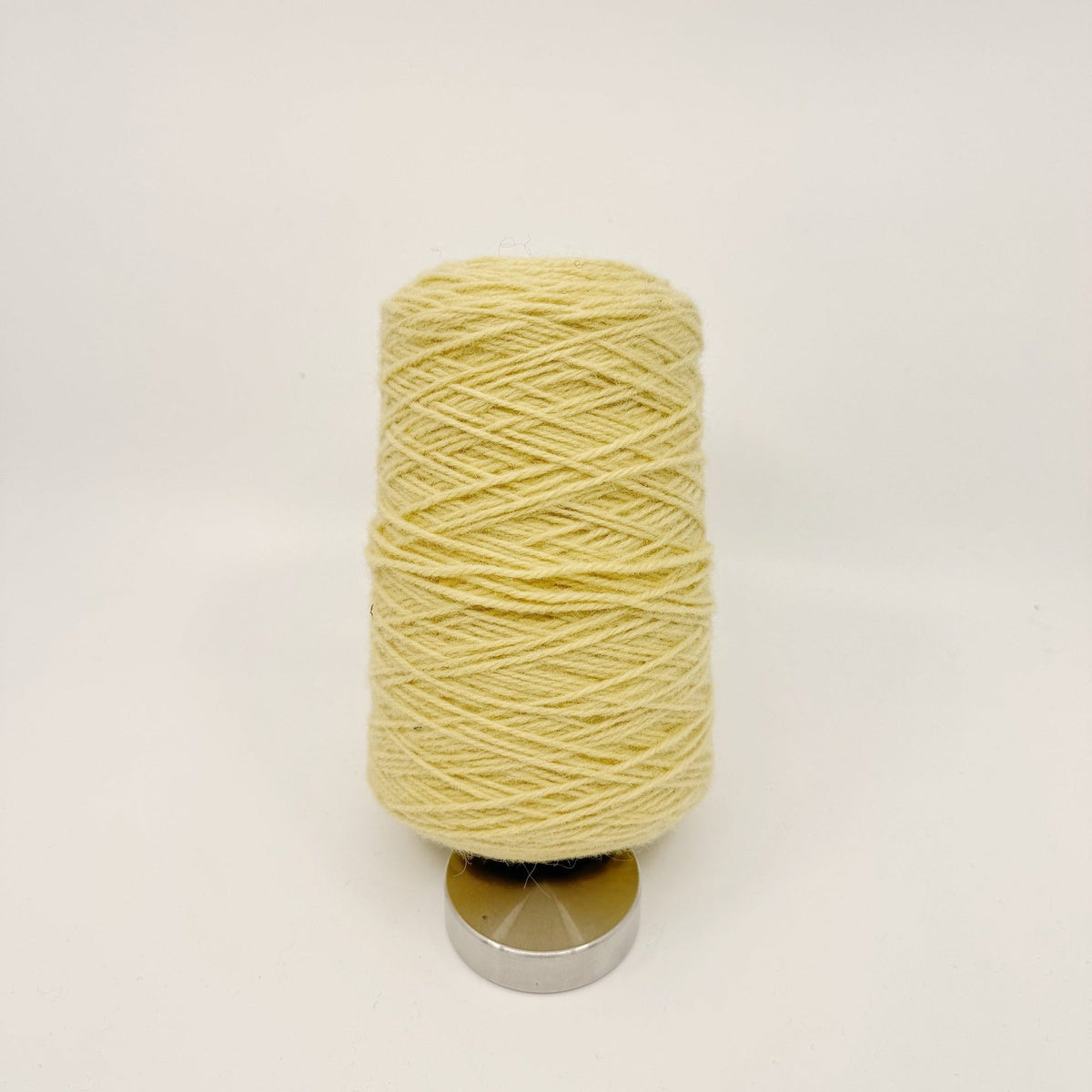 Tufting wool cone in a warm orange shade