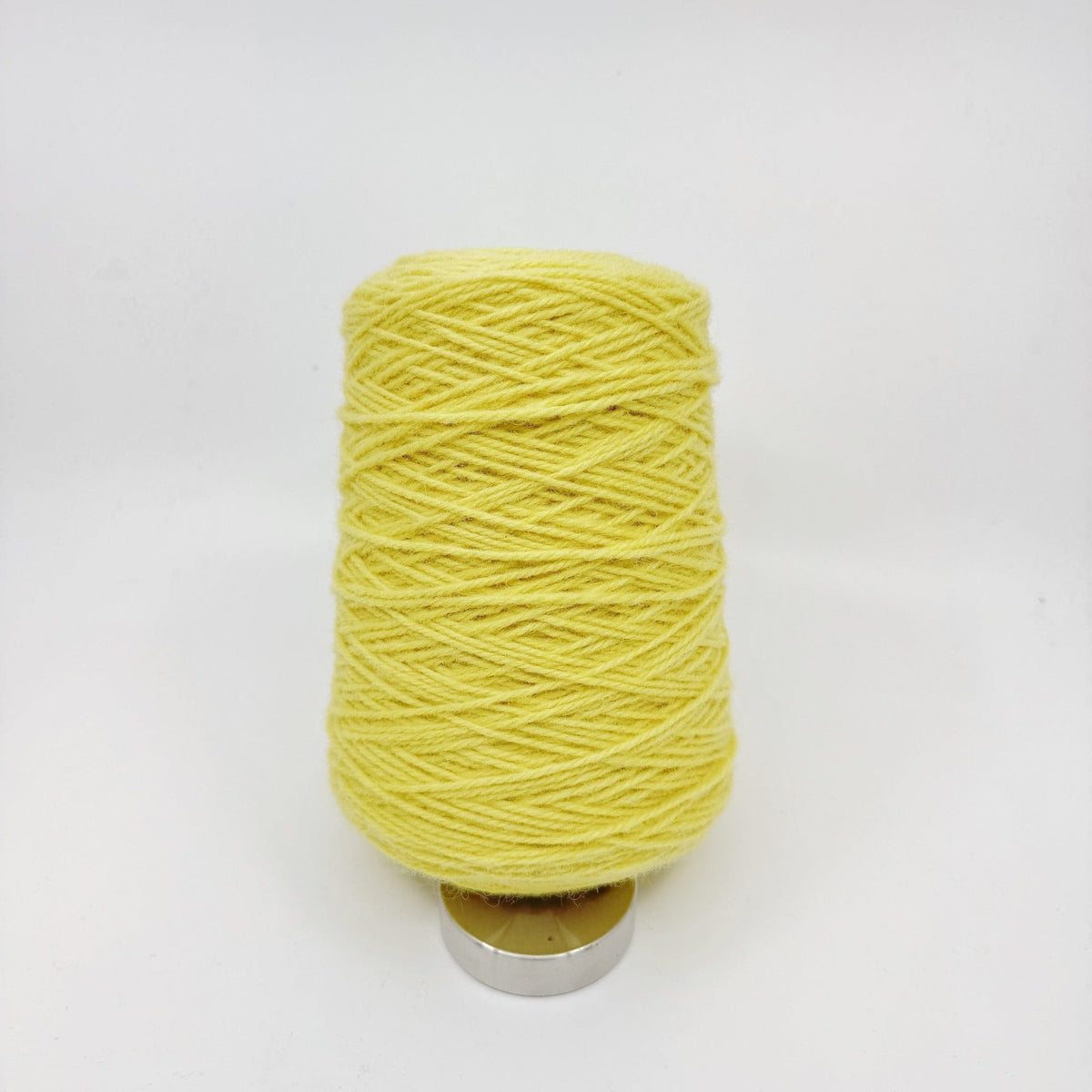 Tufting wool cone in a muted pastel shade