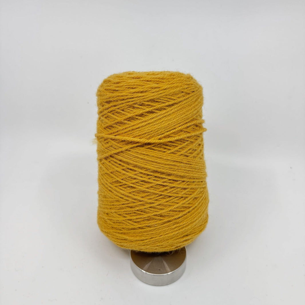 Tufting wool cone close-up of wound yarn