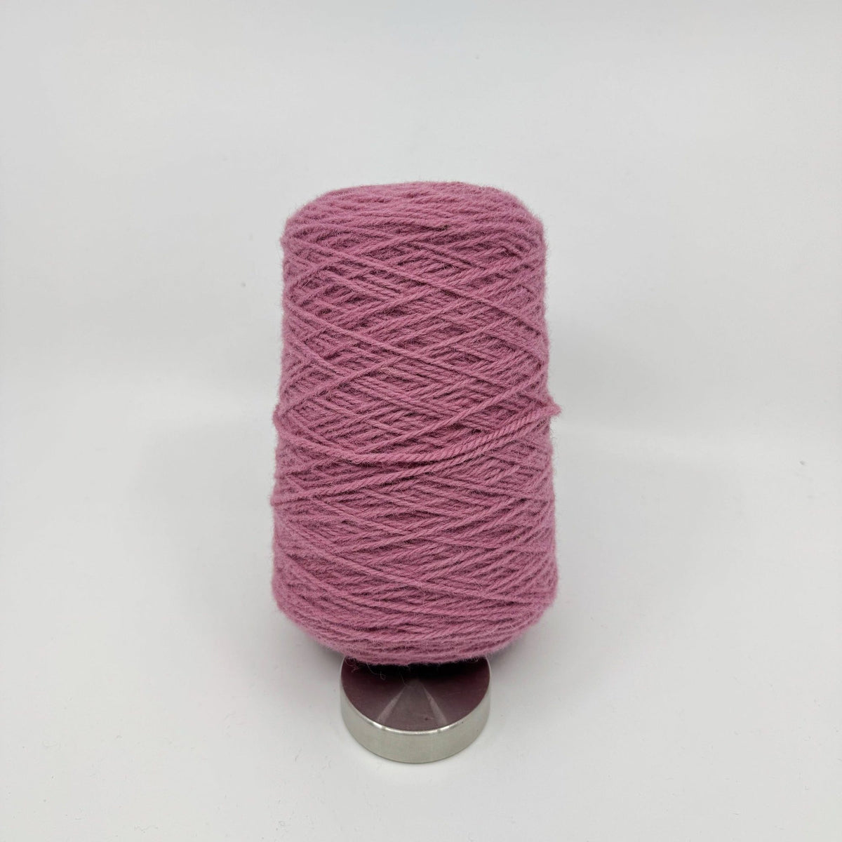 Tufting wool cone with visible ply detail