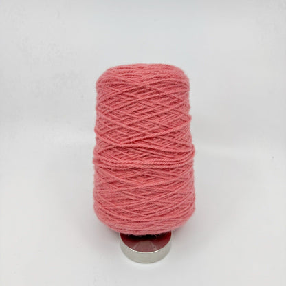 Tufting wool cone close-up showing yarn texture