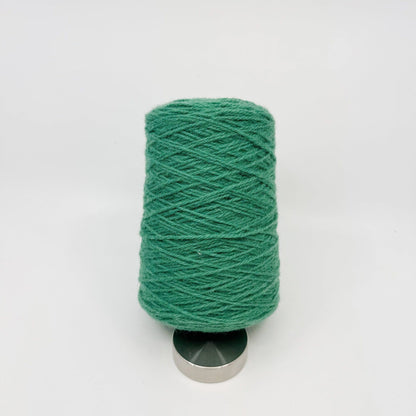 Tufting wool cone in a dusty mauve shade