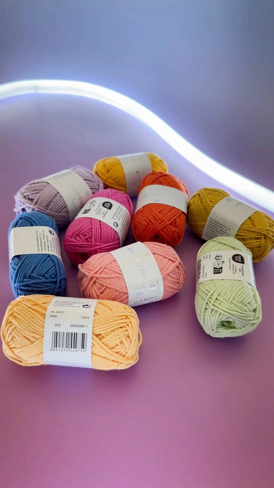 Ricorumi DK cotton yarn balls arranged by colour