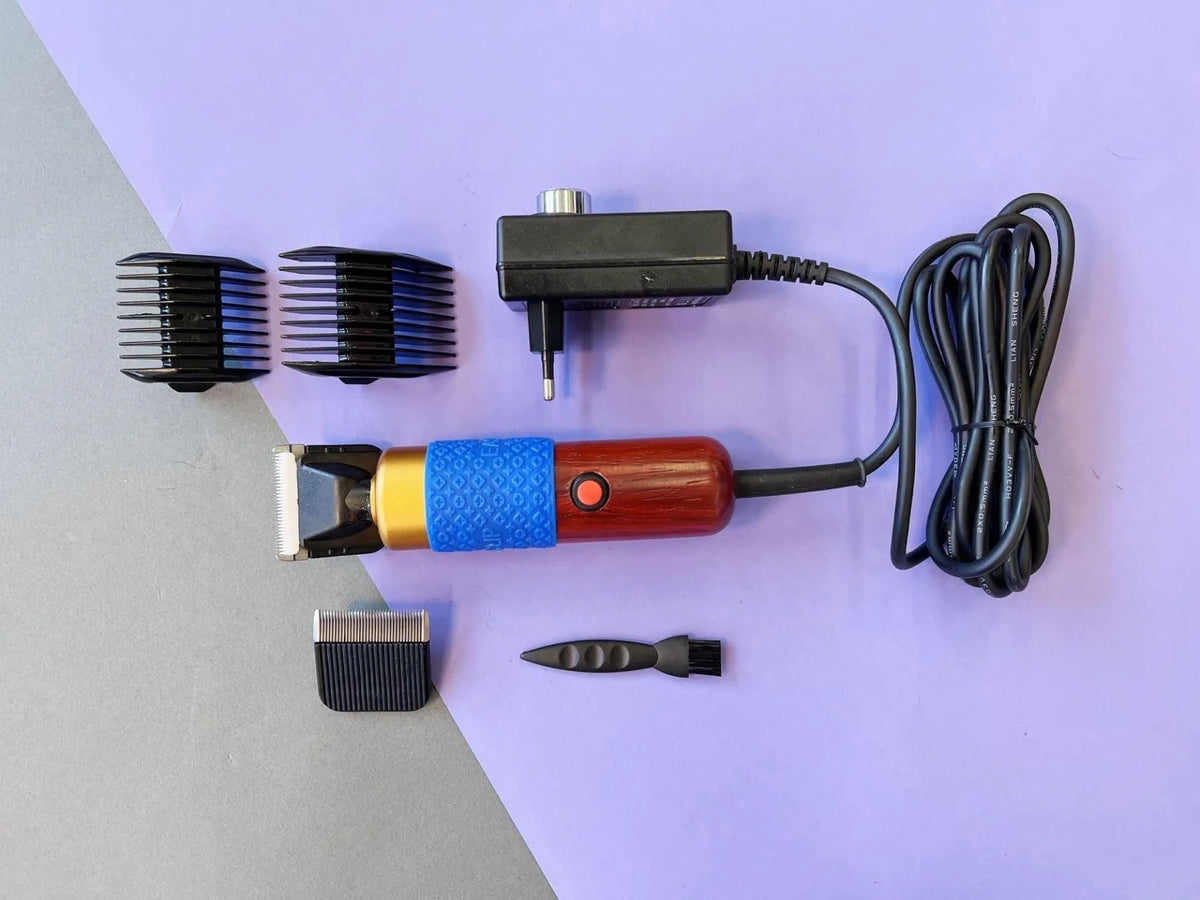 Rug carving clipper for shaving tufted pile